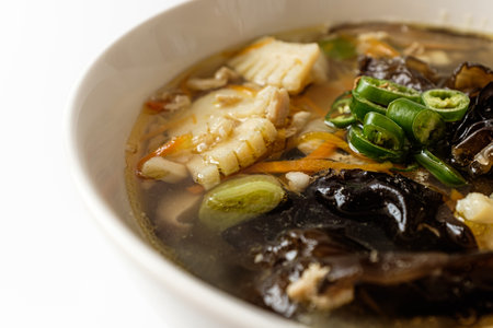 White Jamppong Soup on a white backgroundの写真素材