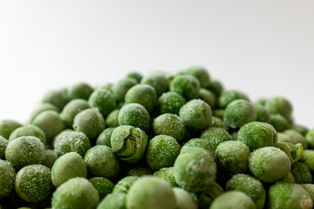 green peas on a white backgroundの写真素材