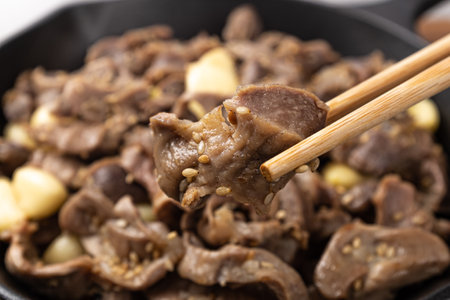 Stir-fried Spicy and Chewy Chicken Gizzard with Garlicの写真素材