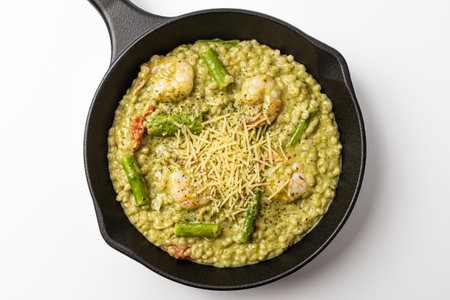 Asparagus risotto on a white backgroundの写真素材