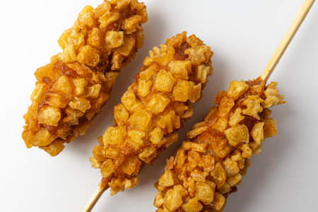 Potato hot dog on a white backgroundの写真素材