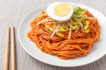 Jjolmyeon made with chewy noodles and spicy seasoningの写真素材