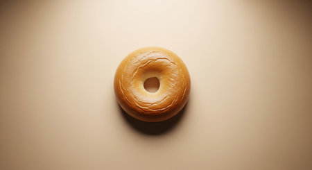 Bagel on a beige background. View from above.の素材