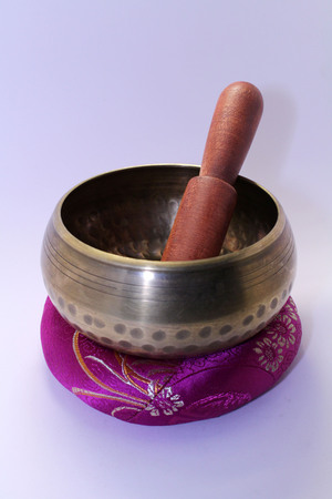 A Buddhist Tibetan singing bowl made in Nepal. A close up view.の写真素材