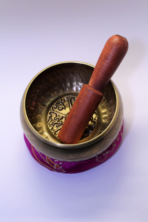 A Buddhist Tibetan singing bowl made in Nepal. A close up view.の写真素材