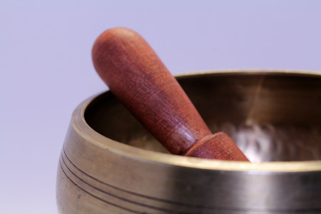 A Buddhist Tibetan singing bowl made in Nepal. A close up view.の写真素材