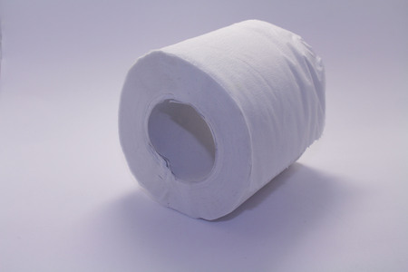 A roll of toilet paper or tissue (British). Taken with white background.の写真素材