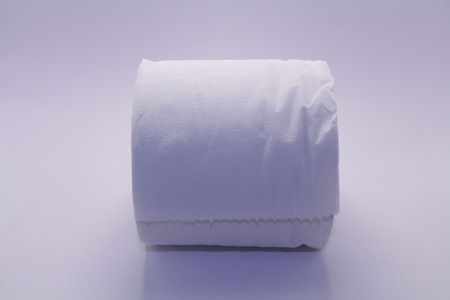 A roll of toilet paper or tissue (British). Taken with white background.の写真素材