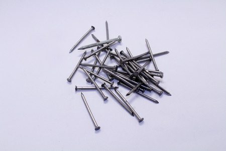 A pile of nails, a pin shaped object of metal used as fastener. Trivial but essential.の写真素材