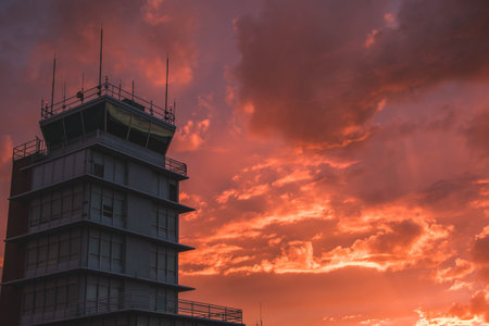 Airport control tower at sunset
