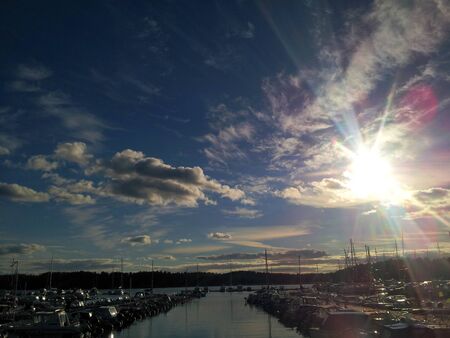 Boats, water and the sun. Summer 2016, Espoo, Finlandの写真素材