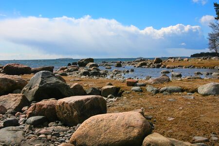Rocks on the coast and blue skyの写真素材