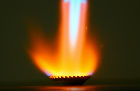 Gas torch flame reflection from washerの写真素材