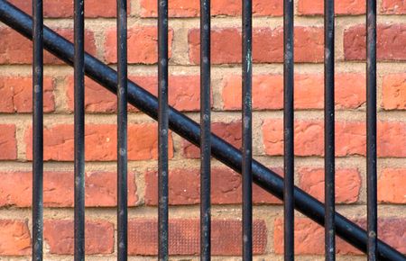 Brickwall with fenceの写真素材