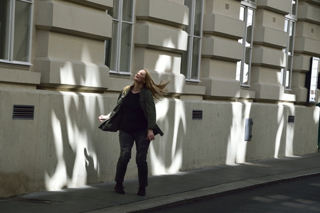 Blonde woman dancing in the sea of ??lights in Viennaの写真素材