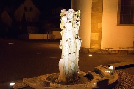fontain in front of a church in sulzbach germanyの写真素材