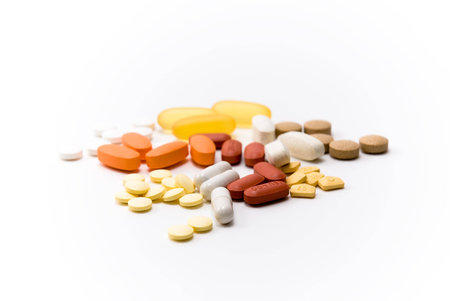 Assorted medicine and  pills on white background