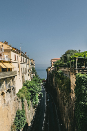 Beach with Roads Surrounded by Mountainous Buildingの写真素材