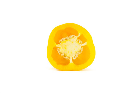 Half of yellow bell peppers isolated on  over white backgroundの写真素材
