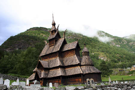 Picturesque landscape with the Borgund stave church in Norwayの写真素材