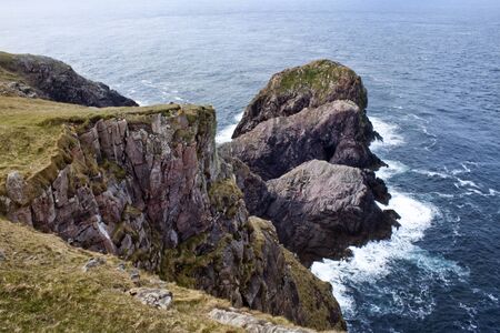 Rocks in ocean, Cape Wrath, Scotlandの写真素材