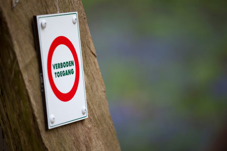 No entry sign on wooden pole