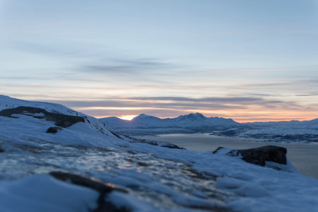 View over the mountains and fjords during sunset in northern Norway