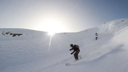 Skier at ski slope in the alpsの写真素材