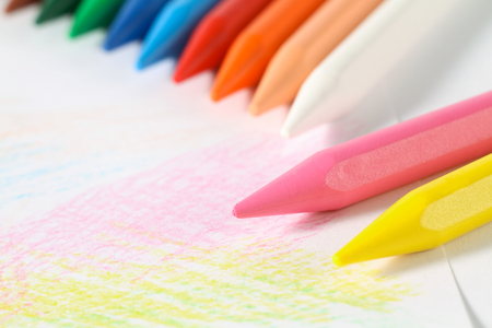 Crayons for drawing on a background of strokesの写真素材