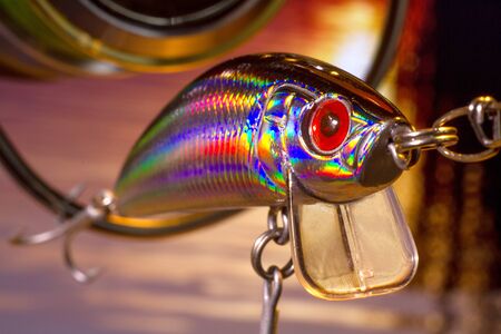 Fishing Lures close-up on a background of an evening riverの写真素材