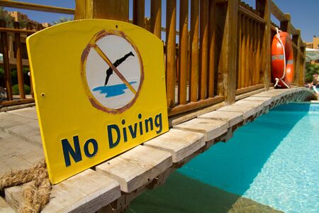 plate not dive at the poolの写真素材
