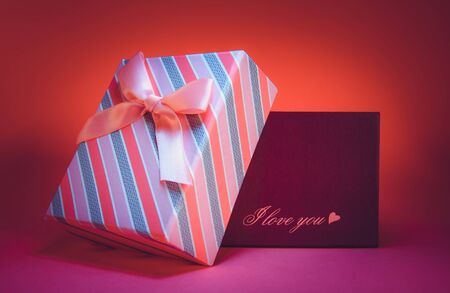 colorful gift box on a dark backgroundの写真素材