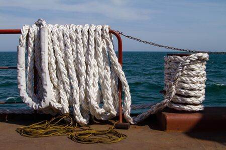 White mooring rope piled on Leer vesselの写真素材