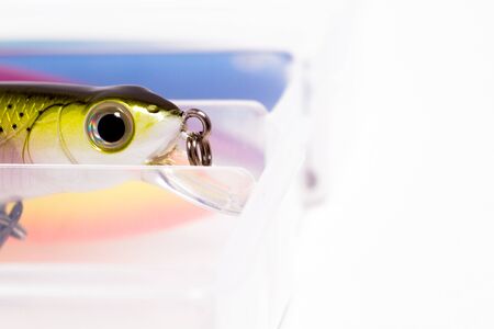 wobbler closeup in a box with fishing luresの写真素材