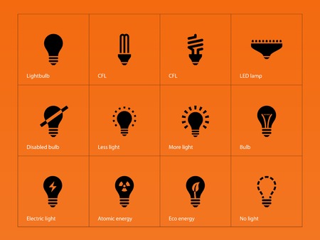 Light bulb and CFL lamp icons on orange background. Vector illustration.のイラスト素材