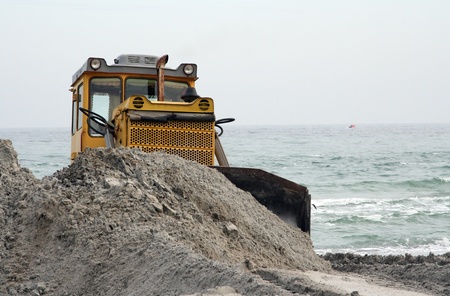 Dredge digging sand on seacostの写真素材