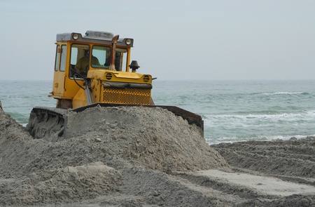 Dredge digging sand on seacostの写真素材
