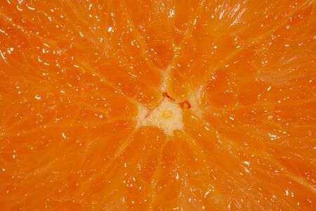 Slice of an orange close upの写真素材