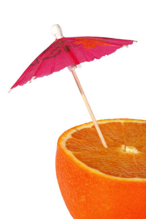 Orange with an umbrella on a white background の写真素材