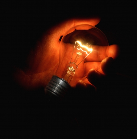Light bulb in handの写真素材