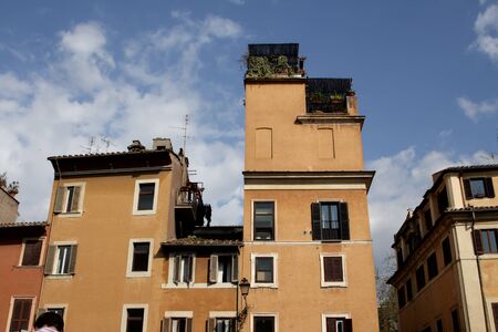 Facade of the Italian house against the blue sky の写真素材