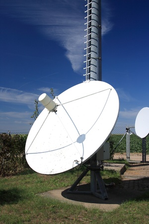 The satellite aerial against the blue skyの写真素材
