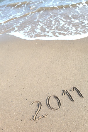 New 2011 year on sandの写真素材