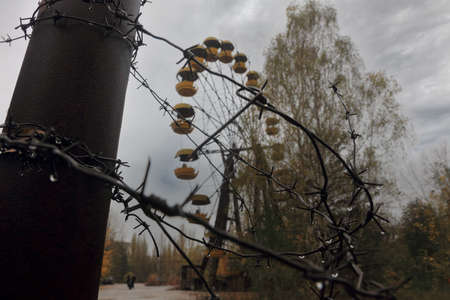 Amusement park in the abandoned city of Pripyat, after the accident at the Chernobyl nuclear power plant. Pripyat, Ukraine.の写真素材