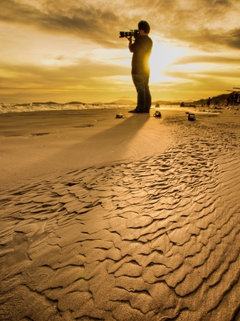 A cameraman in a silhouette sceneの写真素材