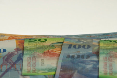 Money of different countries on a white background, close-up.