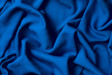 Crumpled blue cotton fabric, trend color of the year 2020 Classic Blue.