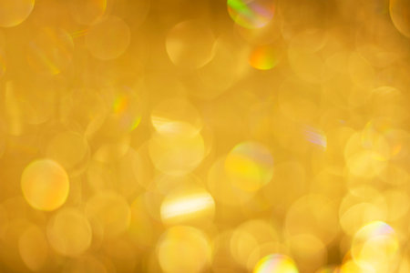 Beautiful gold color bokeh close up, abstract background, festive concept