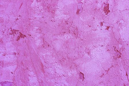 Pink stucco a surface abstract texture and background, close upの写真素材