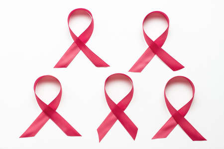 Many pink ribbons on white background, a concept breast cancer awareness monthの写真素材